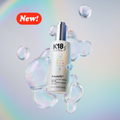 New K18 FutureIQ hair longevity serum bottle in iridescent serum bubbles