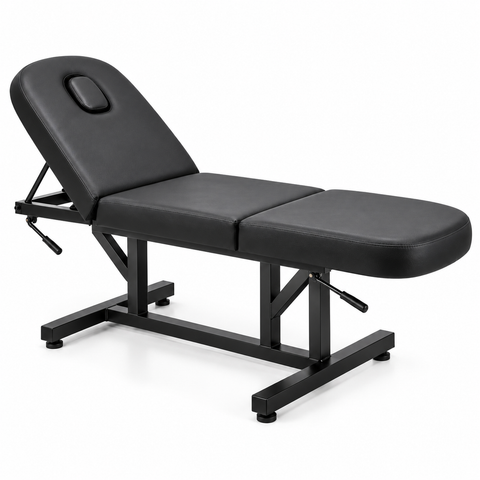 Adjustable black 3-section beauty and massage treatment bed with face hole, side angle view