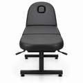 Adjustable black beauty treatment and massage bed with face hole, front view